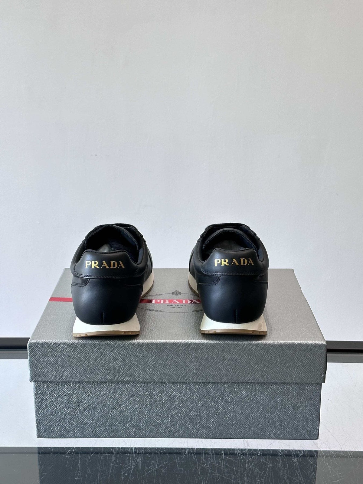 Prada Men's Black Low-Top Sneakers - Black Upper With White And Tan Accents