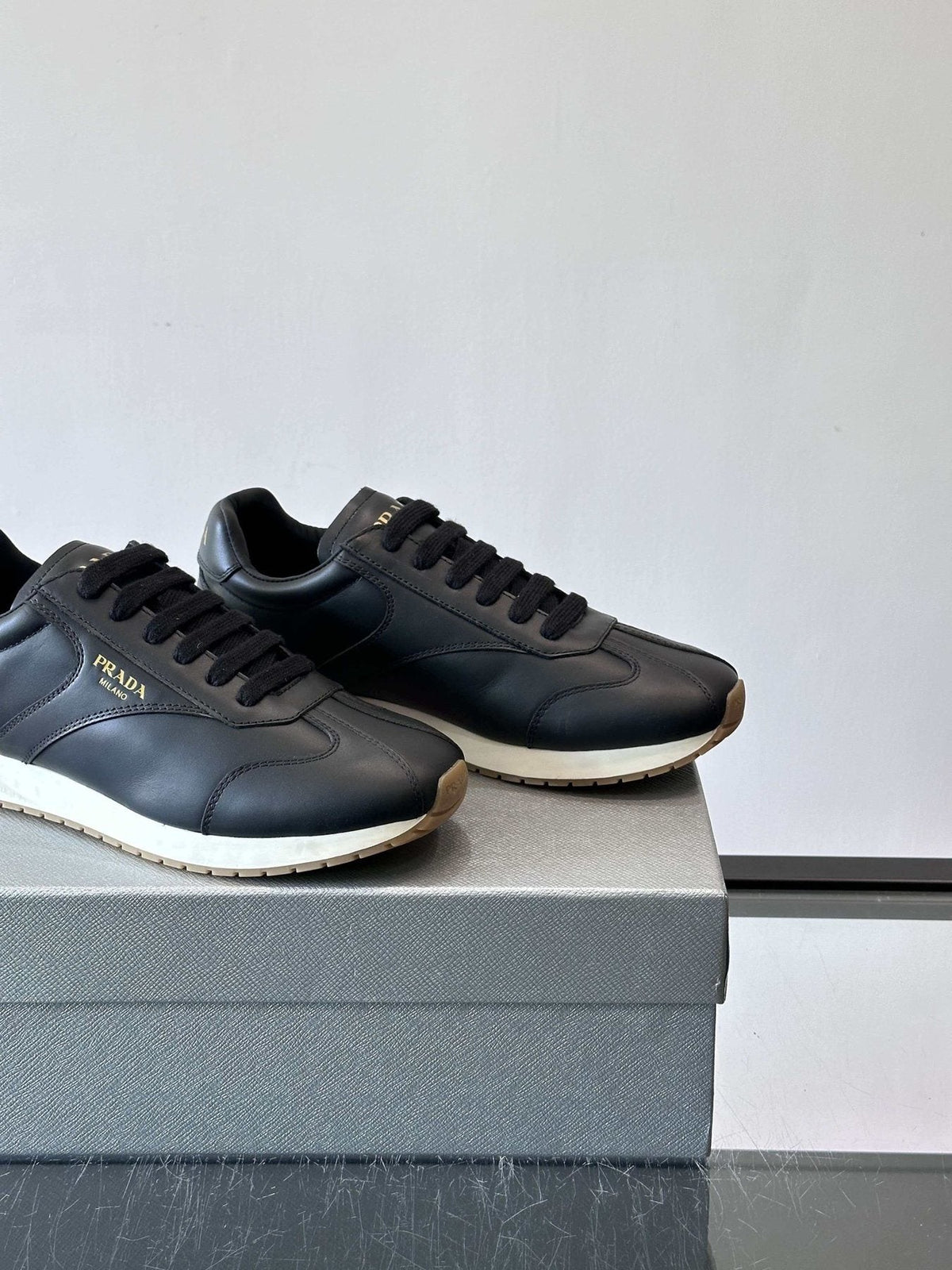 Prada Men's Black Low-Top Sneakers - Black Upper With White And Tan Accents